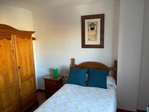 Posteľ alebo postele v izbe v ubytovaní Apartamento Ravel Playa Málaga