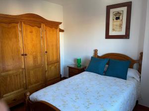 Posteľ alebo postele v izbe v ubytovaní Apartamento Ravel Playa Málaga