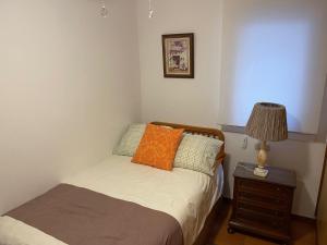 Posteľ alebo postele v izbe v ubytovaní Apartamento Ravel Playa Málaga