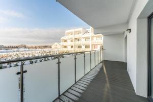 Balkón nebo terasa v ubytování Sunset Resort III, Nadmorska 100A