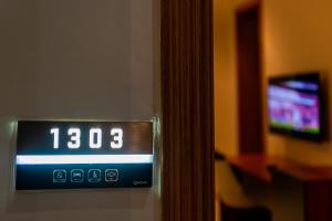 TV a/nebo společenská místnost v ubytování Wali's Suites