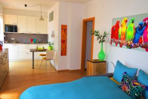 Ένα ή περισσότερα κρεβάτια σε δωμάτιο στο Appartement Piave, Meran Zentrum, mit Garage