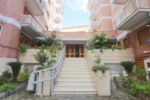 a set of stairs leading to a building at Le stanze di Mami in Salerno