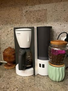 a coffee maker and a blender on a counter at 3+1,villa, 10min to KadıköyPier in Istanbul