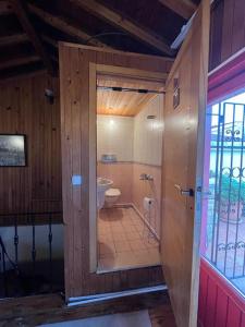 a bathroom with a shower and a toilet in a room at 3+1,villa, 10min to KadıköyPier in Istanbul