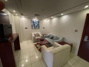 Posezení v ubytování رؤوم إن للشقق المخدومة-Raoum Inn Serviced Apartments