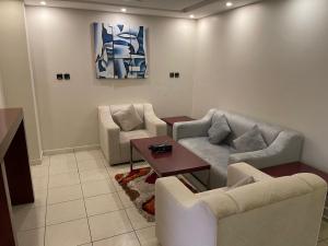 Posezení v ubytování رؤوم إن للشقق المخدومة-Raoum Inn Serviced Apartments