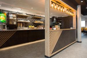 Lounge nebo bar v ubytování ACE Hôtel Lyon Vénissieux Parc des Expositions