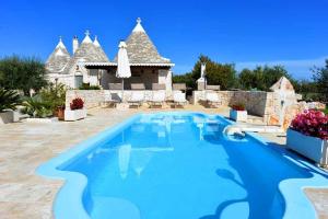 The swimming pool at or close to Trullo Antico with exclusive swimming pool