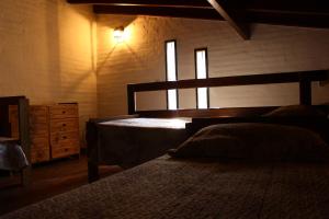 Postel nebo postele na pokoji v ubytování Vista del sol + 2 fotografie