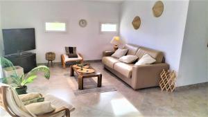 Posedenie v ubytovaní COSY LODGE GITE APPARTEMENT MEUBLE CiTY BREAK