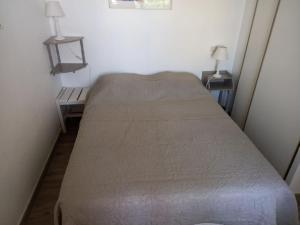 Posteľ alebo postele v izbe v ubytovaní Capao 160, piscine, parking, clim
