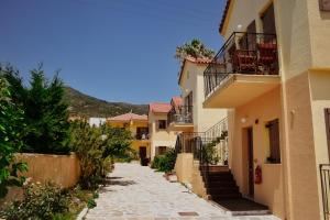 a street in a town with buildings at Stella Apartments in Marathokampos