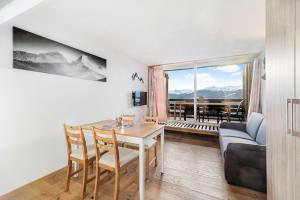 Istumisnurk majutusasutuses Chaleureux studio à Anzère, accessible à ski, proche de tout