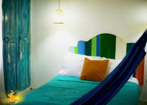 Postel nebo postele na pokoji v ubytování Hotel Casa La Pilonera