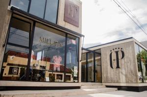 a store front with a large glass window at 126 Suite Centro II in Suipacha
