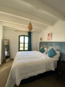 A bed or beds in a room at Atlantic Hostel