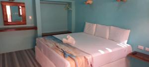 Postel nebo postele na pokoji v ubytování Hotelito Villas Holbox