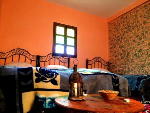 Postel nebo postele na pokoji v ubytování Gite entre les Vallées