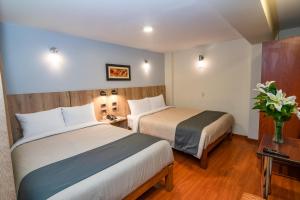 Postel nebo postele na pokoji v ubytování Casa Villa Arequipa + 26 fotografií