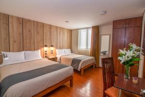 Postel nebo postele na pokoji v ubytování Casa Villa Arequipa