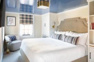 Postel nebo postele na pokoji v ubytování Beacon Hill Hotel