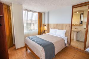 Postel nebo postele na pokoji v ubytování Casa Villa Arequipa