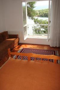 Posedenie v ubytovaní Apartment Bugenvila