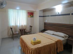 Postel nebo postele na pokoji v ubytování HOTEL ESTRELLA