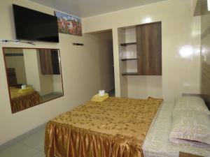 Postel nebo postele na pokoji v ubytování HOTEL ESTRELLA