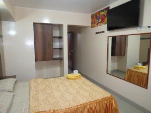 Postel nebo postele na pokoji v ubytování HOTEL ESTRELLA