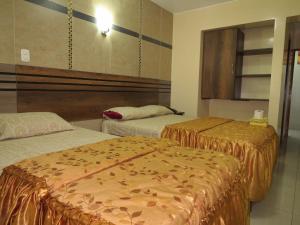 Postel nebo postele na pokoji v ubytování HOTEL ESTRELLA