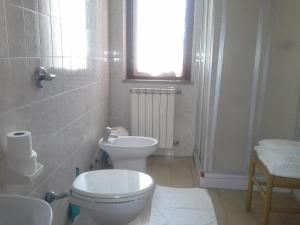 Koupelna v ubytování Hotel Ticino Ristorante Chierico