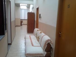 Postel nebo postele na pokoji v ubytování Hotel Ticino Ristorante Chierico