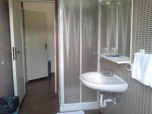 Koupelna v ubytování Hotel Ticino Ristorante Chierico