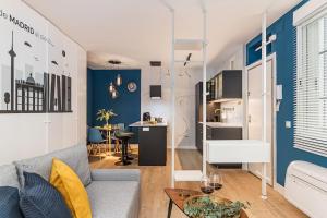 A seating area at Bonito apartamento en Malasaña / Gran Vía