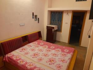 Ένα ή περισσότερα κρεβάτια σε δωμάτιο στο A Luxury Villa Homestay with private kitchen By Premier Hotels