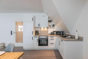 Køkken eller tekøkken på Langeneß + 6 billeder