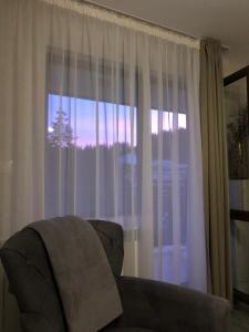 Кът за сядане в Luxury Aparthotel STUDENETS