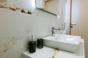 Koupelna v ubytování Hermes Appartment + 24 fotografií