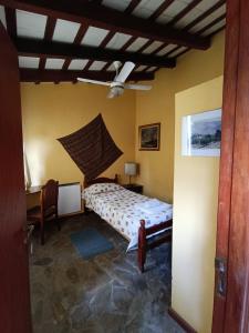 a bedroom with a bed in a room at La Cara Oculta de Salta Bed and Breakfast in Salta +55 photos