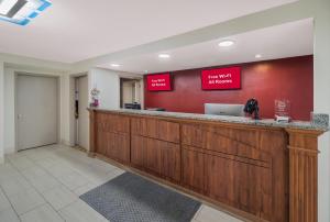 a lobby with a reception desk in a hotel at Red Roof Inn & Suites Jackson, TN in Jackson +31 photos