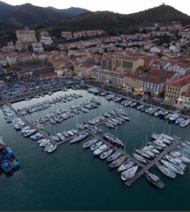 an aerial view of a harbor filled with boats at Maison 90 m2, 5 min du Port, 15 min des Criques à Pied in Port-Vendres