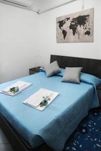 Postel nebo postele na pokoji v ubytování MAVI'S HOME
