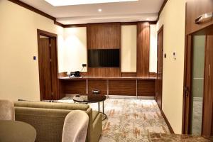 TV a/nebo společenská místnost v ubytování فندق رويال فيستا Royal Vista Hotel