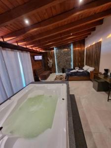 Postel nebo postele na pokoji v ubytování No 4 Lofts Jacuzzi Mazamitla