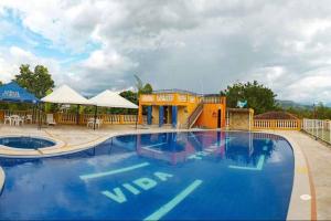 Bazén v ubytování Hostal Campestre Vida Tranquila nebo v jeho okolí