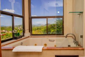 Koupelna v ubytování Malinche 38A Luxury Apartment - Reserva Conchal