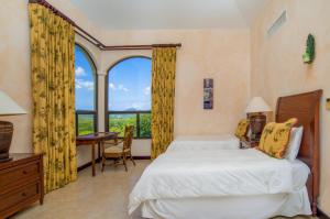Postel nebo postele na pokoji v ubytování Malinche 38A Luxury Apartment - Reserva Conchal