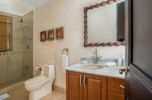 Koupelna v ubytování Malinche 38A Luxury Apartment - Reserva Conchal
